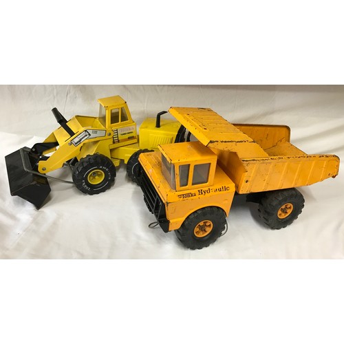 669 - A Mighty Tonka hydraulic dumper truck together with a Tonka Turbo Diesel front end loader XMB-975.