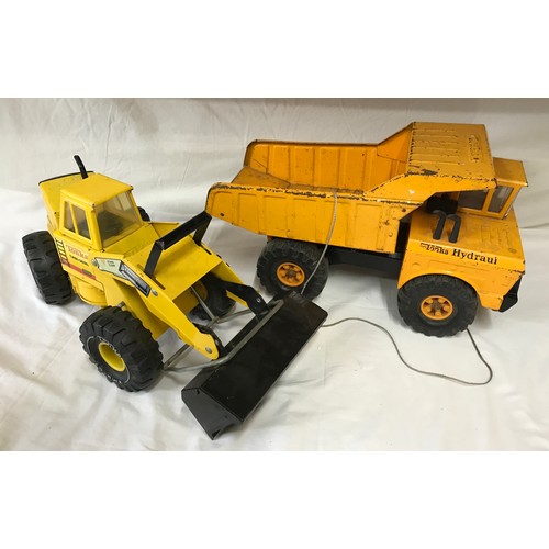 669 - A Mighty Tonka hydraulic dumper truck together with a Tonka Turbo Diesel front end loader XMB-975.