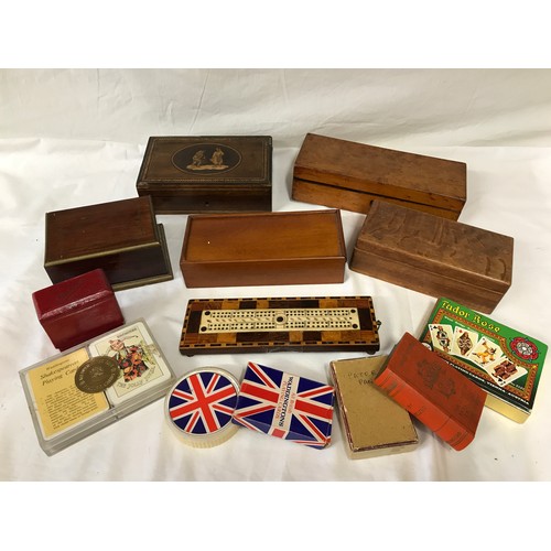 670 - A collection of 19thC and vintage games to include a burr wood box of bone dominoes, a bone cribbage... 