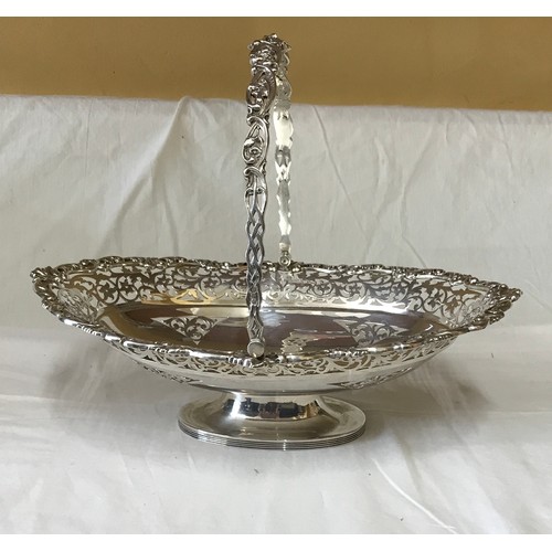 539 - Silver bowl with handle by William Hutton & Sons, London 1907. 31cm l x 25cm h to top handle x 25cm ... 