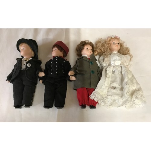 672 - An Armaud Marseille doll approx. 47cm h together with four smaller dolls, 17cm h.