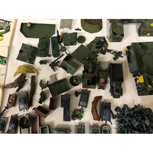 680 - Plastic military toy collection to include various soldiers, tanks, gun emplacement bases and trucks... 