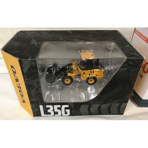 688 - Boxed diecast model vehicles, TMC scale models Hitachi ZX35OLC-6 Hydraulic Excavator, Volvo producti... 