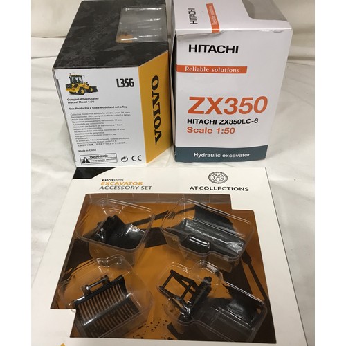 688 - Boxed diecast model vehicles, TMC scale models Hitachi ZX35OLC-6 Hydraulic Excavator, Volvo producti... 