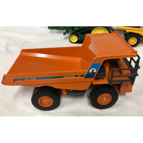 690 - Diecast model construction vehicles of various makes, Ertl Tracked Tractor, Siku Euclid R32 Dumper, ... 