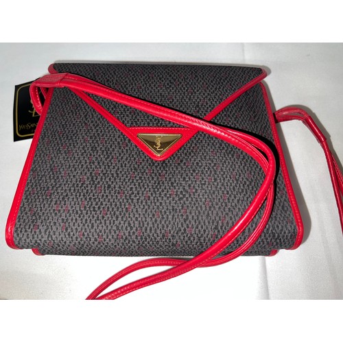 493 - A 1980's Yves Saint Laurent red part leather two section handbag.  23 w x 20cm h.