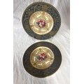 Pair of hand painted Royal Worcester plates signed E Phillips, 27cm d. Depicting flowers to the cent... 
