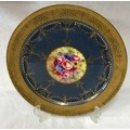 Royal Worcester plate signed J Stanley, 27cm d. Depicting flowers to the centre and raised decoratio... 