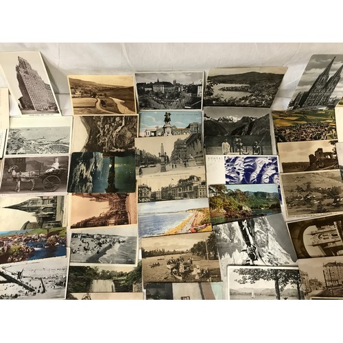 857 - A 100 assorted postcards collection, mono and colour topographical, British, European and some World... 