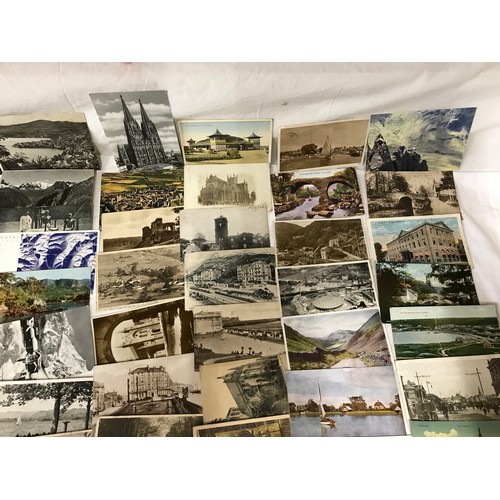 857 - A 100 assorted postcards collection, mono and colour topographical, British, European and some World... 