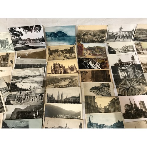 859 - A 105 assorted postcards, colour and mono, British and European topographical cards.