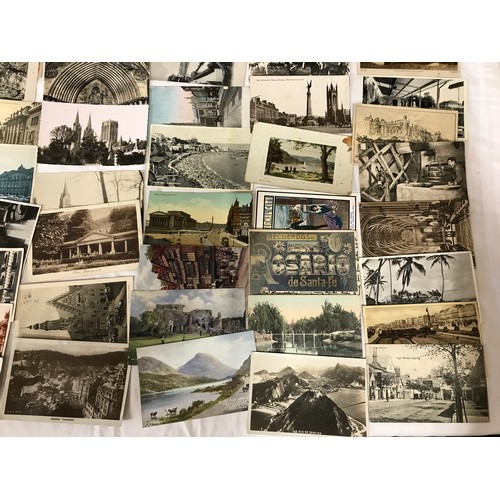 859 - A 105 assorted postcards, colour and mono, British and European topographical cards.