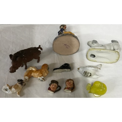 49 - A collection of 10 ceramic figurines to include 2 x Royal Doulton miniature Toby jugs, Royal Doulton... 