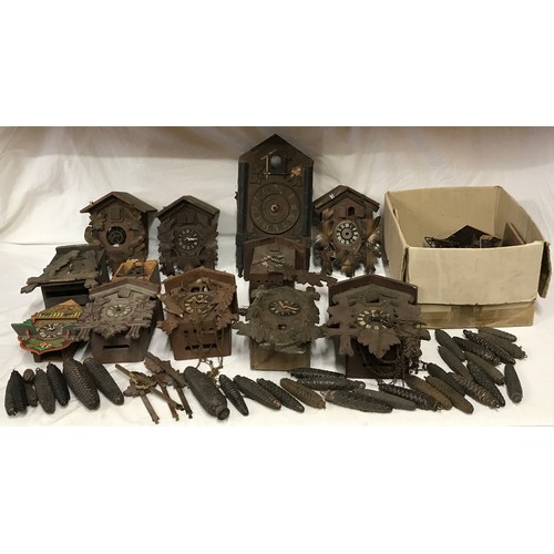 827 - Box of 12 Cuckoo Clock Frames incl weights, pendulums etc for spares and repairs.