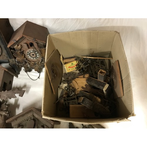 827 - Box of 12 Cuckoo Clock Frames incl weights, pendulums etc for spares and repairs.