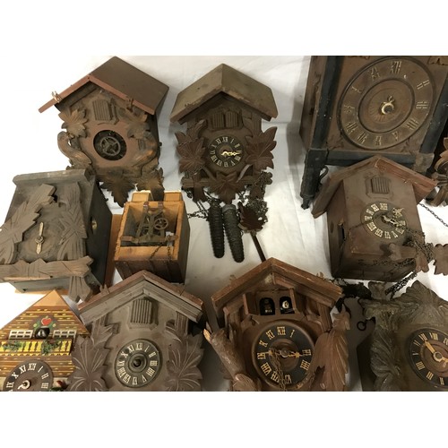 827 - Box of 12 Cuckoo Clock Frames incl weights, pendulums etc for spares and repairs.