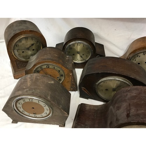 830 - Nine wooden mantel clocks not complete spares/repairs.