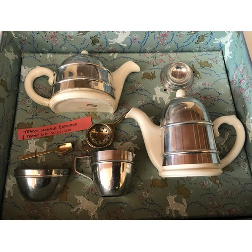 704 - Two boxed children's toy tea sets, one Kavin Kupid Products pottery and chrome 8 piece, and the othe... 