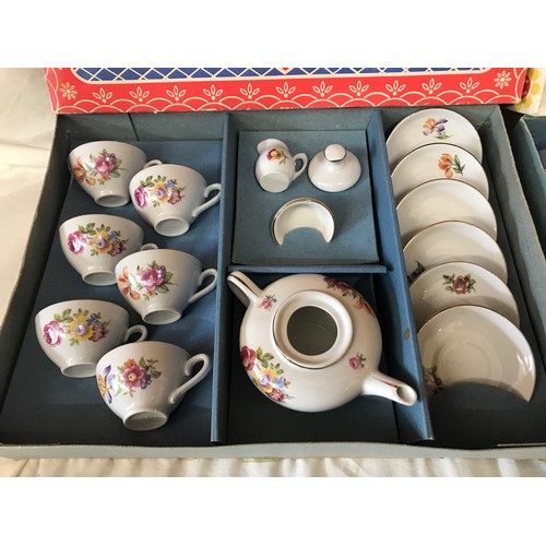 705 - Two children's  pottery tea sets in original boxes, one floral 15 piece and one yellow and blue 11 p... 