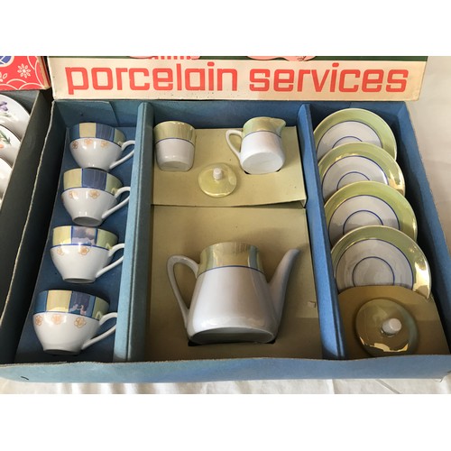 705 - Two children's  pottery tea sets in original boxes, one floral 15 piece and one yellow and blue 11 p... 