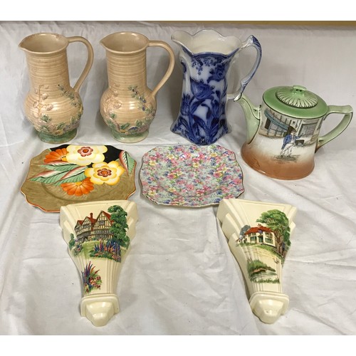 65 - A ceramic selection to include: pair Royal Winton wall vases, pair of Melba Springtime jugs 21cm, Cr... 
