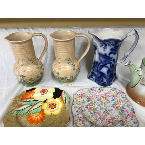 65 - A ceramic selection to include: pair Royal Winton wall vases, pair of Melba Springtime jugs 21cm, Cr... 