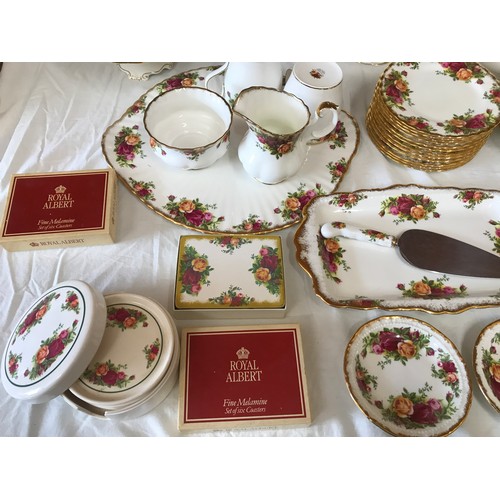 68 - A Royal Albert Old Country Roses bone china part tea and coffee service to include: cafetiere 25cm h... 