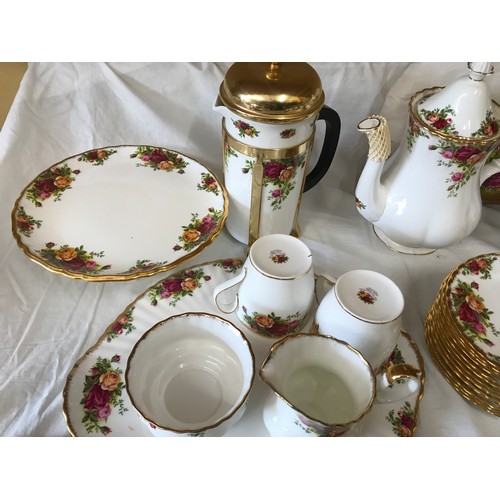 68 - A Royal Albert Old Country Roses bone china part tea and coffee service to include: cafetiere 25cm h... 