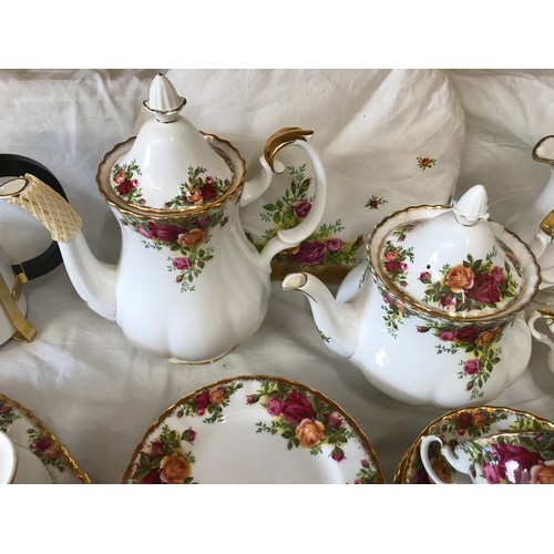 68 - A Royal Albert Old Country Roses bone china part tea and coffee service to include: cafetiere 25cm h... 