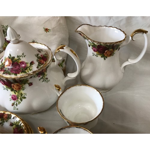 68 - A Royal Albert Old Country Roses bone china part tea and coffee service to include: cafetiere 25cm h... 