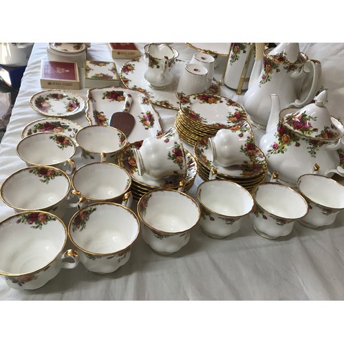 68 - A Royal Albert Old Country Roses bone china part tea and coffee service to include: cafetiere 25cm h... 