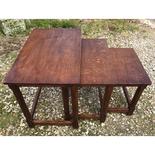 783 - Robert Mouseman Thompson oak nest of three tables, largest table size. 61 w x 38 d x 48cm h.