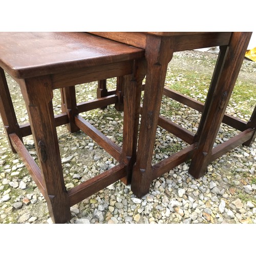 783 - Robert Mouseman Thompson oak nest of three tables, largest table size. 61 w x 38 d x 48cm h.