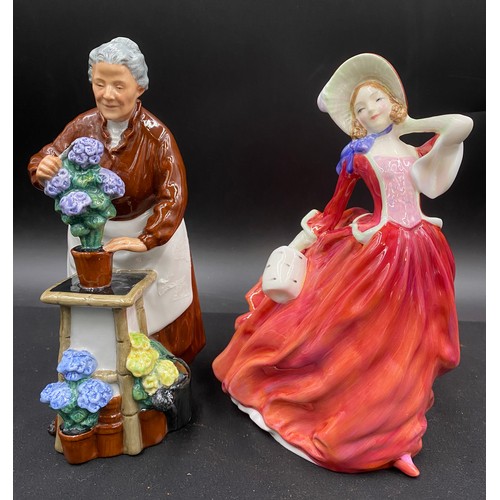 76 - Three Royal Doulton figurines to include Autumn Breezes HN1934, Flora HN2349 and Taurus Sandra HN534... 