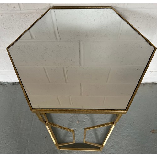 1219 - A metal framed hexagon side table with mirror top. Top 45cm d x 85cm h.