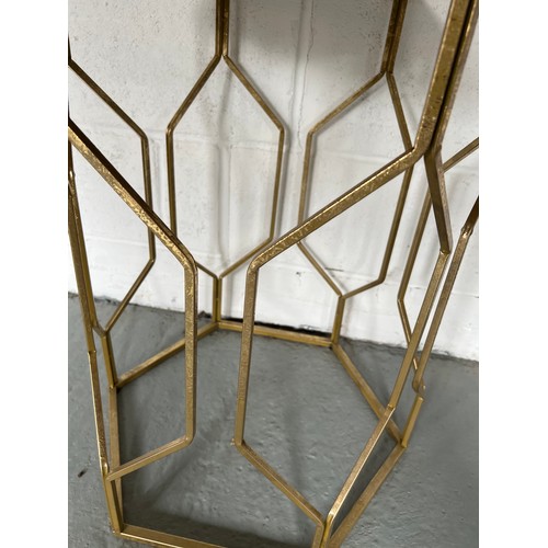 1219 - A metal framed hexagon side table with mirror top. Top 45cm d x 85cm h.