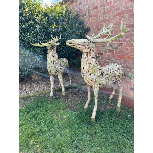 1362 - A pair of large driftwood art deer figures. 145cm h to antler x 130cm l approx.