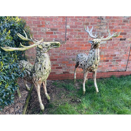 1362 - A pair of large driftwood art deer figures. 145cm h to antler x 130cm l approx.