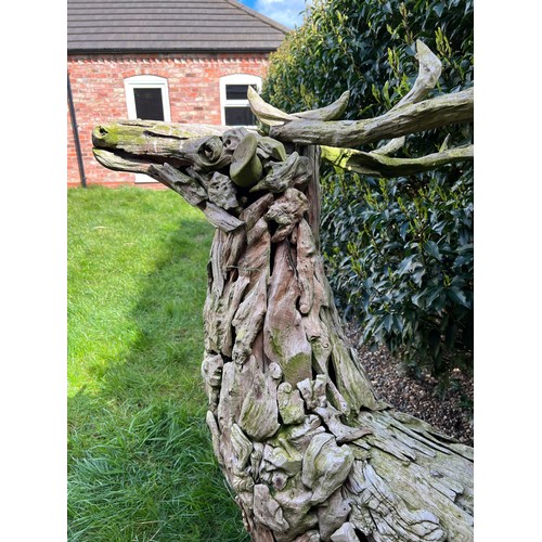 1362 - A pair of large driftwood art deer figures. 145cm h to antler x 130cm l approx.