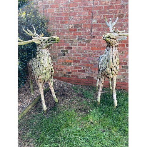 1362 - A pair of large driftwood art deer figures. 145cm h to antler x 130cm l approx.