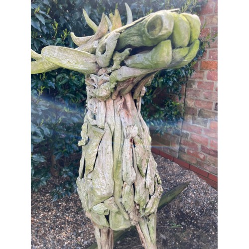 1362 - A pair of large driftwood art deer figures. 145cm h to antler x 130cm l approx.