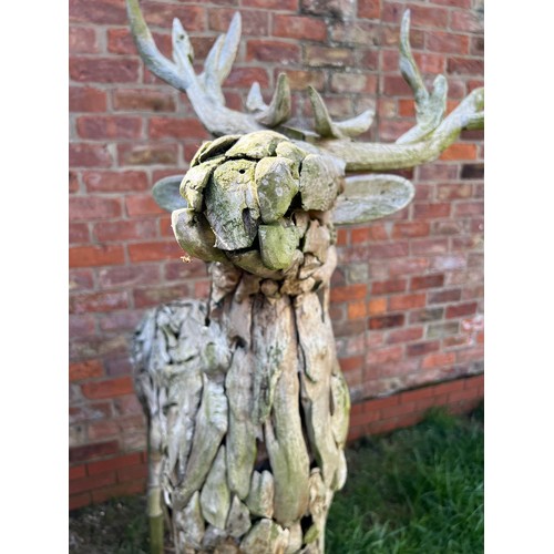 1362 - A pair of large driftwood art deer figures. 145cm h to antler x 130cm l approx.