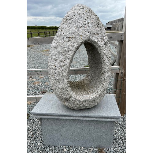 1363 - A quartz/ granite egg shaped garden sculpture on stand with internal light. 144 cm h on stand. 97cm ... 