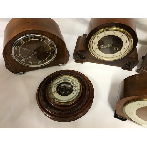 836 - A collection of 4 mid 20thC mantle clocks, 2 by Smiths of Great Britain together with a round wooden... 