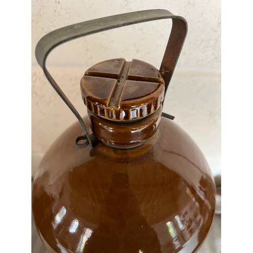 78 - Stoneware jar Wine container, Magdale Vinery Limited Quality Wines. 46cm h to top of handle.