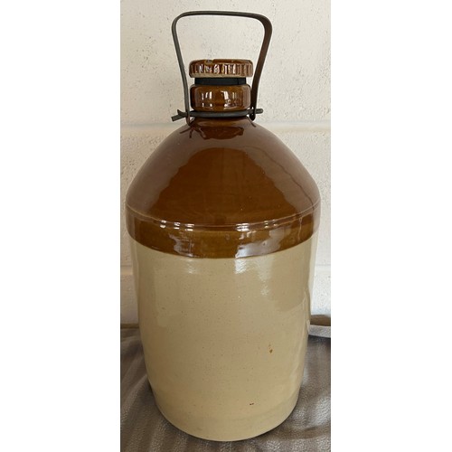 78 - Stoneware jar Wine container, Magdale Vinery Limited Quality Wines. 46cm h to top of handle.