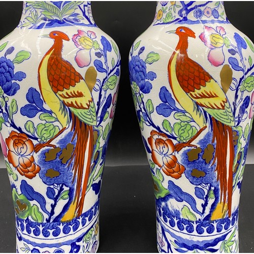 82 - A pair of Masons Ironstone China early 20thC vases of ovoid form, decorated in an Imari palette with... 