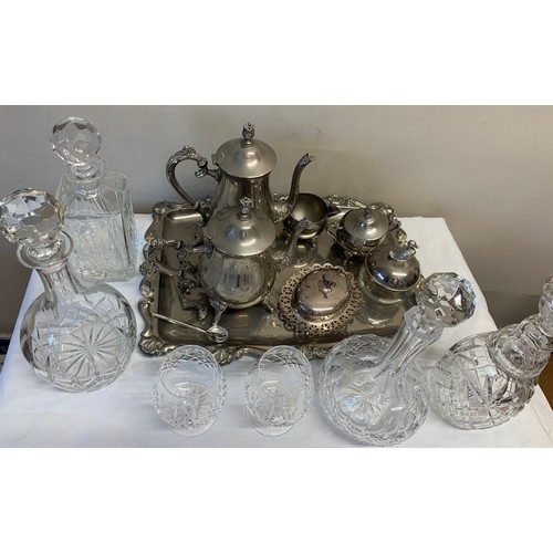 309 - A miscellany to include a quantity of plated items and cut glass decanters and glasses.