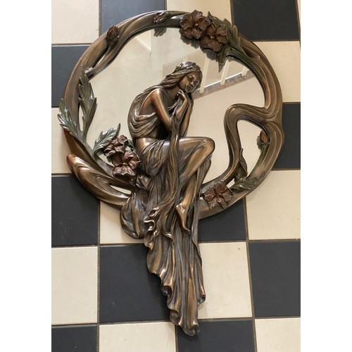 1353 - A 'Veronese' Art Nouveau style mirror of a seated lady and flowers. 70 x 46cm at widest  point.