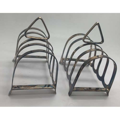 549 - A pair of silver toast racks Sheffield 1945. 124gm. 7.5cm w.